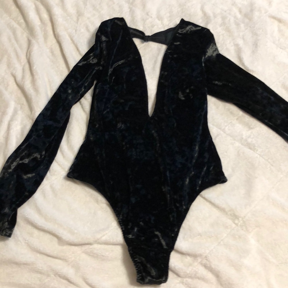 Black velvet body suit.
